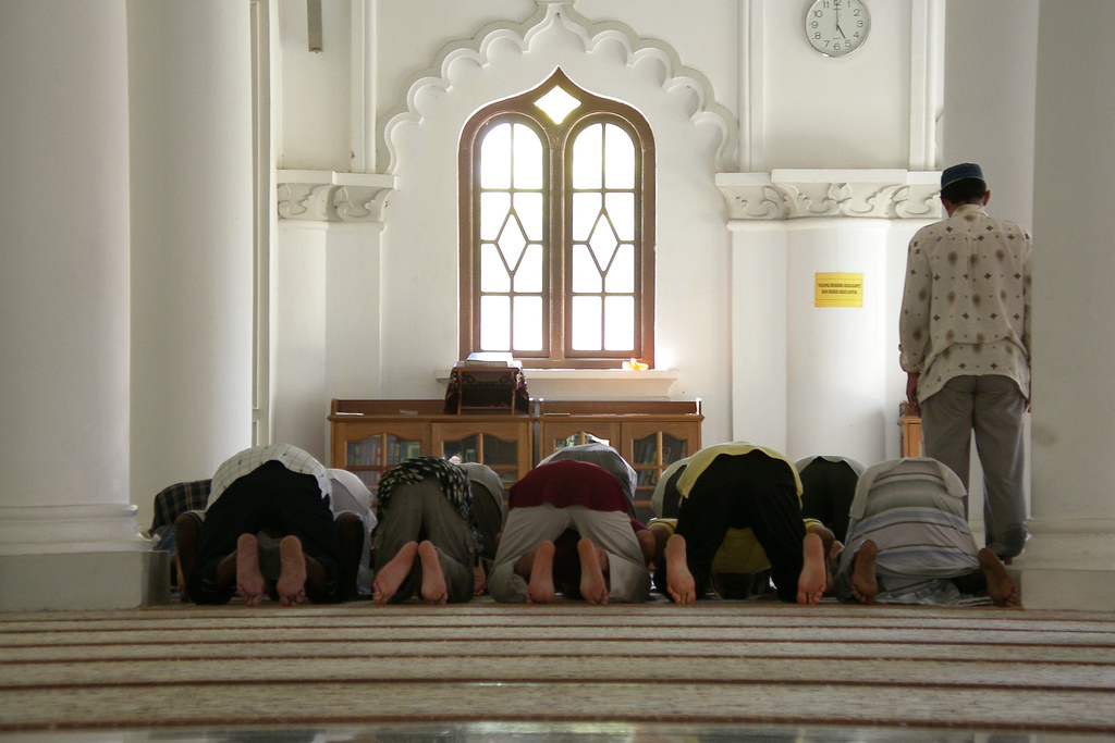 Muslims praying in a mosque, Spotlight Europe