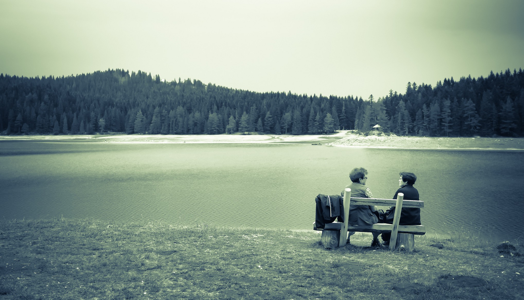 Two women sitting near the Black Lake, Montenegro, Spotlight Europe